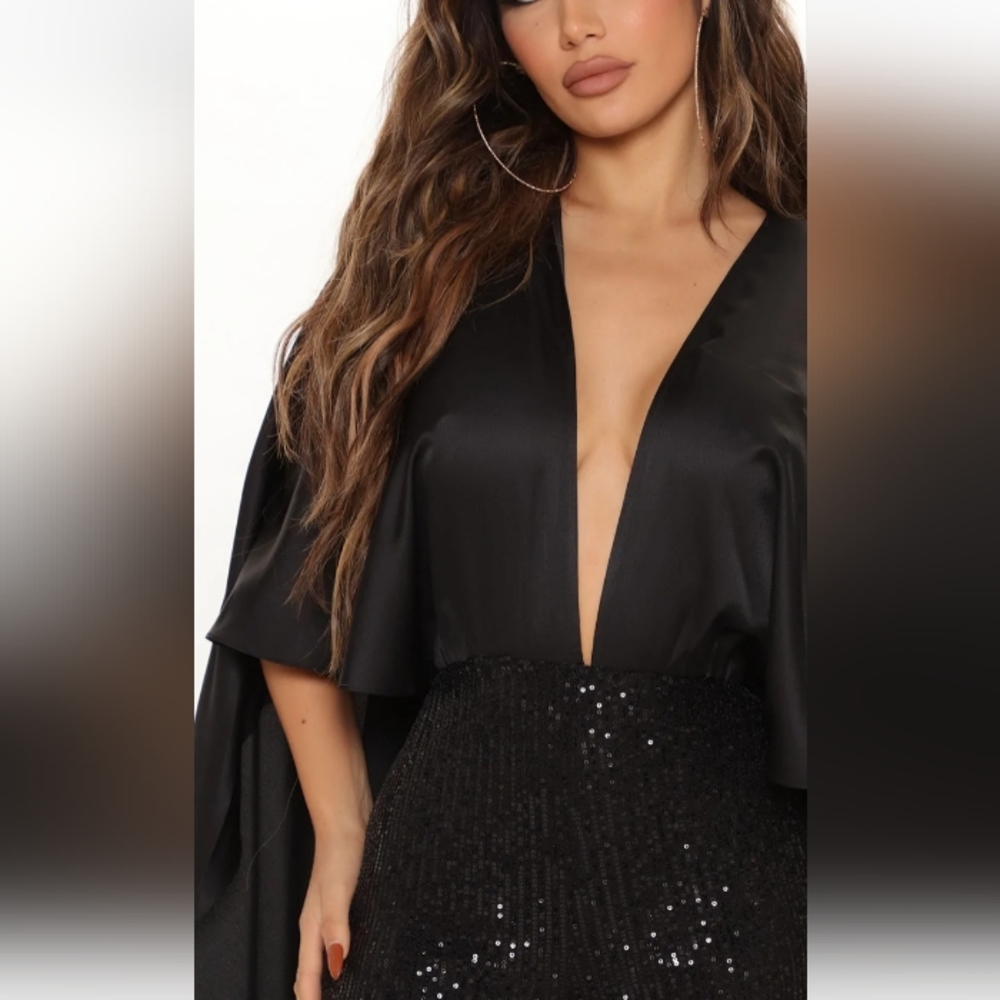 Black Jumpsuit with sequin bottom.  Really Chic!Perfect outfit for the holidays.